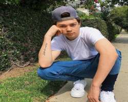 He is a tattoo lover and has a tattoo of writing in his right wrist.